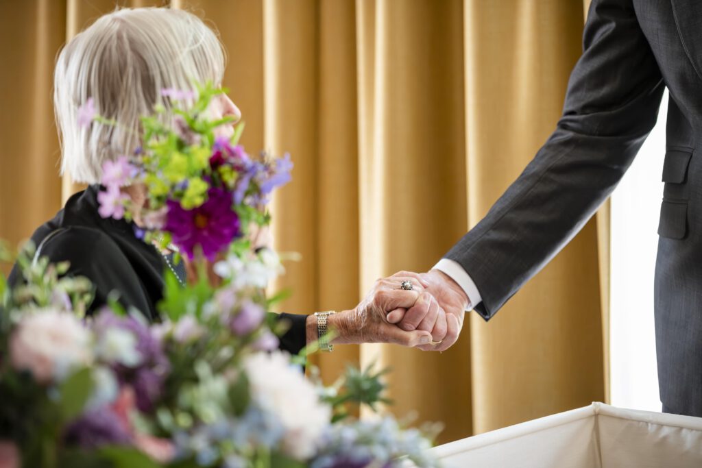 steunzoekende foto tijdens uitvaart